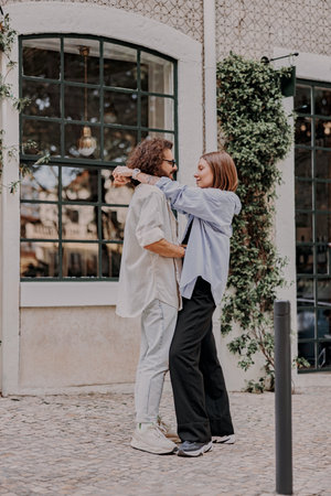 Romantic Tourist couple in love cuddling on old Lisbon street. Travel And tourism In Europe conceptの写真素材