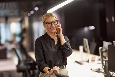 A Professional Woman Engaged at Work in a Modern, Stylish Office Space Environment Todayの写真素材