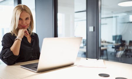 Confident Business Professional Thriving in a Modern Office Environment and Settingの写真素材