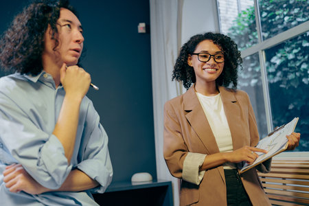 team ends confidently, team wraps up discussion with positive and confident perspective on future stepsの写真素材