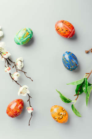 Easter background. Frame made of painted eggs.