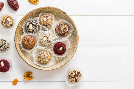 Vegan candies made from nuts and dried fruits. Energy ball. copy spaceの写真素材