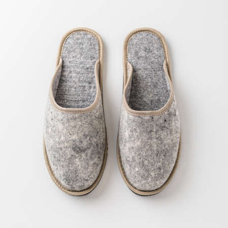 Mens felt slippers. Home shoes made of felted woolの写真素材