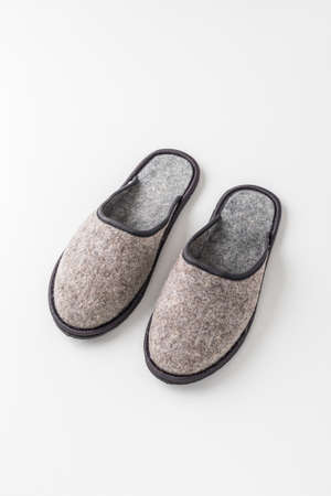 Mens felt slippers. Home shoes made of felted woolの写真素材