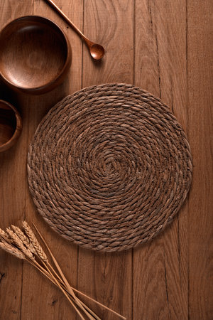 Empty wooden bowl and utensils on wooden background. Top viewの写真素材