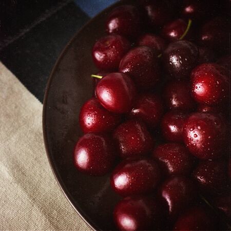 Still Life with fresh cherries in retro styleの写真素材