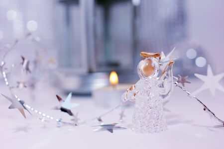 Christmas story about little angel and starsの写真素材