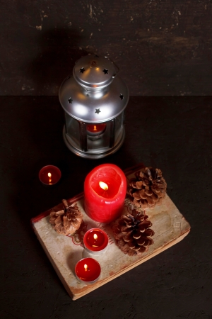 Christmas decoration with candles and old bookの写真素材