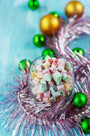 Christmas turkish delight decorated with balls and tinselの写真素材