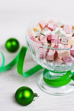 Christmas turkish delight decorated with green ribbonの写真素材