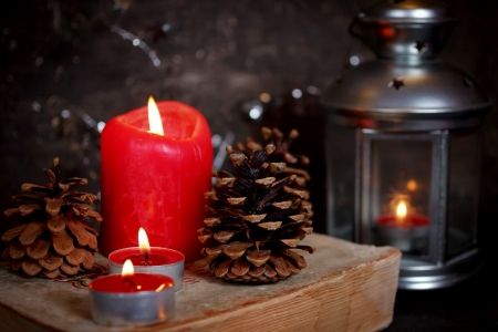 Christmas decoration with candles and old bookの写真素材