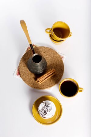 Tasty dessert on the round plate with cup of turkish coffeの写真素材