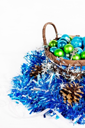 Christmas decoration with different balls and tinsel on white backgroundの写真素材