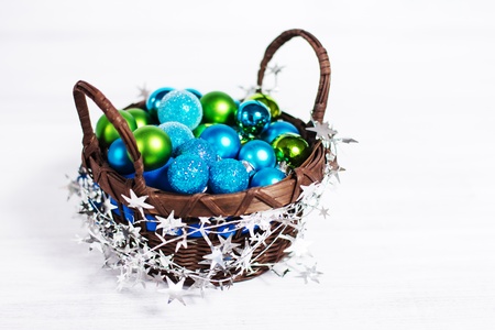 Christmas decoration with different balls and tinsel on white backgroundの写真素材