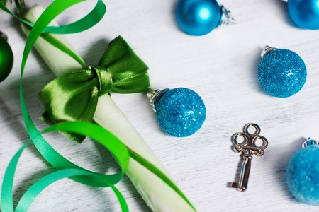 Christmas decoration with lollipop and blue balls on rusty white backgroundの写真素材