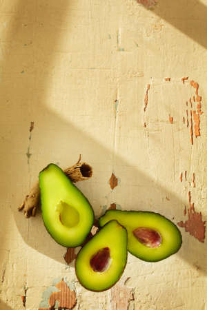 Fresh avocado on wooden backgroundの写真素材