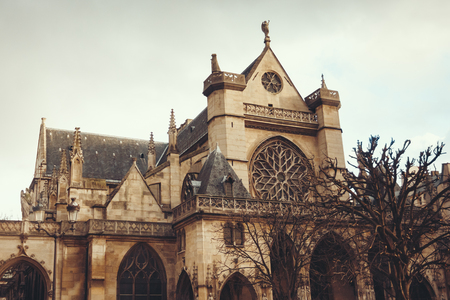 Facade and Sculptures of The Church of Saint-Germain l'Auxerrois. Paris, France. Gothic Background, Image Toned.の写真素材