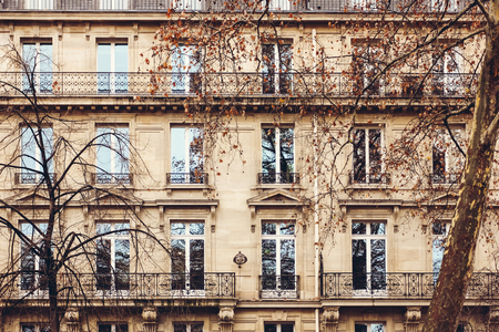 Traditional French Architecture with Typical Windows and Balconies in Paris. Autumn in France.の写真素材