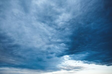 Awesome Nature Background with Sky and Unusual Stormy Cloudsの写真素材