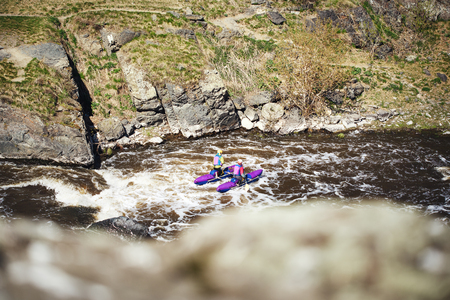 People rafting river rapids. Extreme tourism. Eco tourism.の写真素材