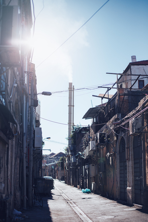 Urban fabric slum, narrow dirty Israel streetの写真素材