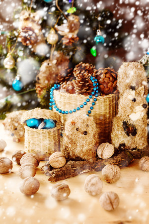Christmas decoration with vintage handmade toys with snow effectの写真素材