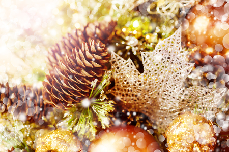 Golden Christmas decoration background with bokeh lightsの写真素材