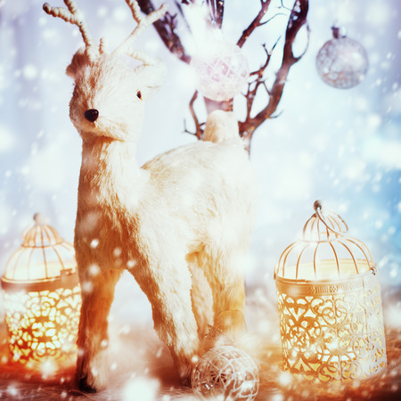 Christmas Decorations with White Enchanting Deer. Selective Focus, Instagram Color Effect.の写真素材