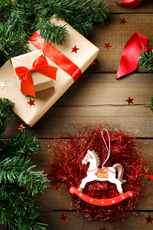 Red and green Christmas decorations. Frame for greetings. Christmas holiday composition.の写真素材