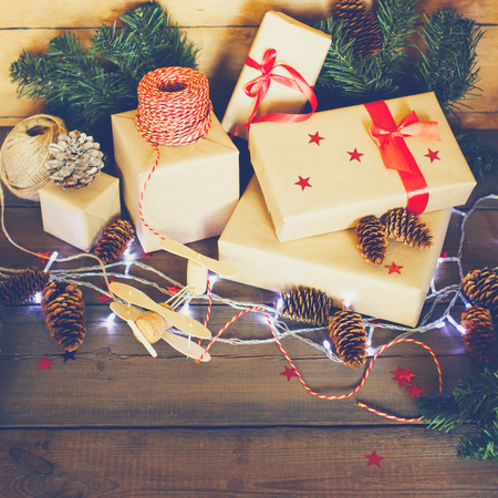 Handmade Christmas composition on wooden background. Christmas lights.の写真素材
