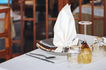 Empty dishware in restaurant, table set
