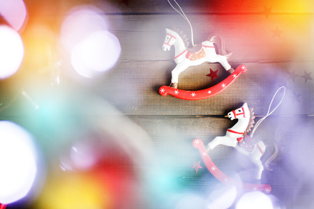 Vintage toy horse with Christmasbokeh  lights. Christmas decorations.の写真素材