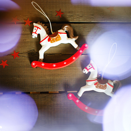 Vintage toy horse with Christmas lights. Christmas toys.の写真素材
