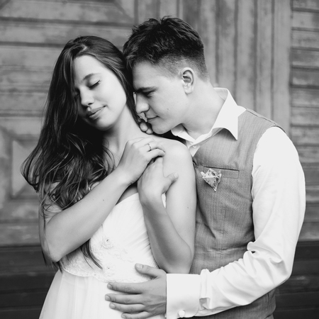 Wedding happy couple. Happy newlywed couple having fun. Black and white portrait.の写真素材