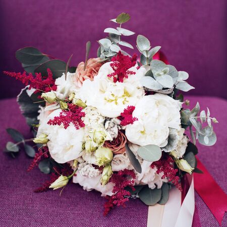 Wedding rustic flowers on purple backgroundの写真素材