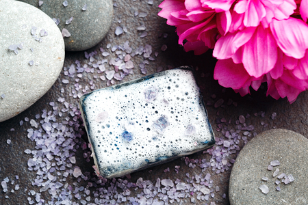 Spa treatment with black cleaning soap and lavender sea salt, top viewの写真素材