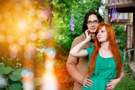 Beautiful romantic loving couple hugging, bokeh lights, romantic peopleの写真素材