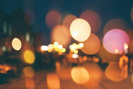 Blurred night city scene background with bokeh lightsの写真素材