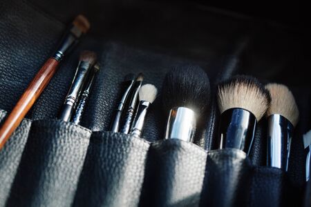 Close-up of open organizer with make-up brushes and toolsの写真素材