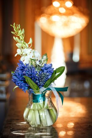 Luxurious bouquet with beautiful blue hyacinths in gorgeous interior, bridal flowersの写真素材