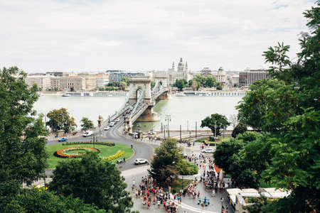 BUDAPEST, HUNGARY - July 23, 2019 - View from the Buda castle on the famous Szechenyi chain bridge, Danube river and square full of touristsのeditorial素材