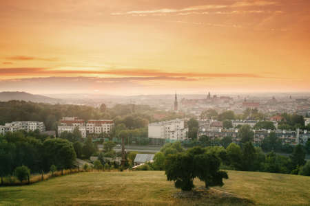 View on Krakow city landscape at the sunset from the Krakus (Krak) Mound in Poland. Tumulus, mythical resting place of Krakow's mythical founder, the legendary King Krakus.の写真素材