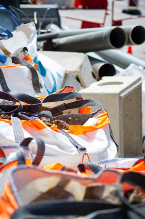 Vibrant and textural photo of an urban construction site. Image shows a dynamic interplay of colors...