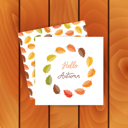 Vector greeting cards on wood background. Autumn leaves made in wreath and monoline lettering. Seamless pattern with mushroom, acorn, oak, maple leaves.のイラスト素材