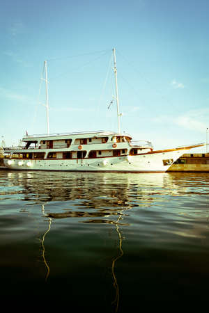 boarding shipCruise ship in the harbor waiting for passengersの写真素材