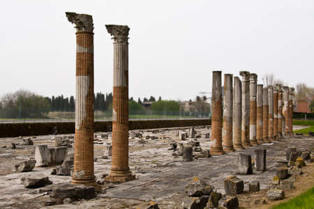 Roman columns in archaeological park in Aquileia, Italyの写真素材