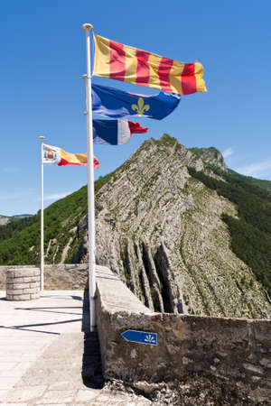flag on the walls of the fortress Sisteron in Franceのeditorial素材