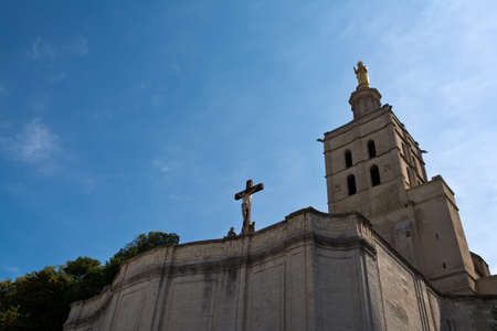 Popes Palace with golden statue of Our Lady on the roof  ,Avignon , Franceのeditorial素材