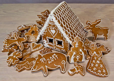 House made from flour and sugar   and Christmas cakesの写真素材