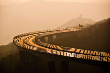 Open highway at sunsetの写真素材